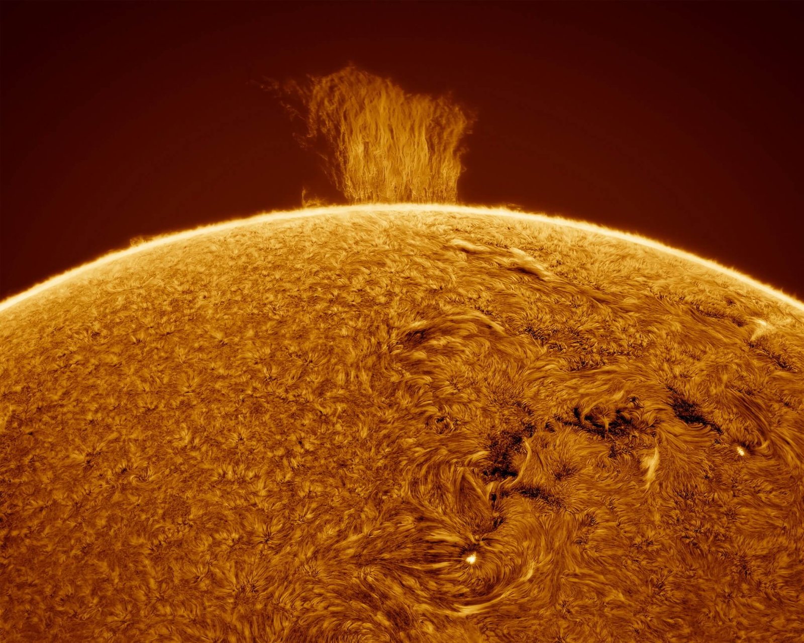 "Wall" of plasma seen extending above the surface of the Sun.